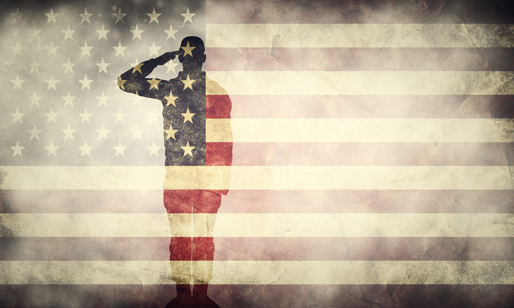 american flag with a transparent man saluting on it